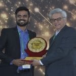 Mr Ramesh Chopra, Executive Chairman, EFY Group handing over the IoT India Awards